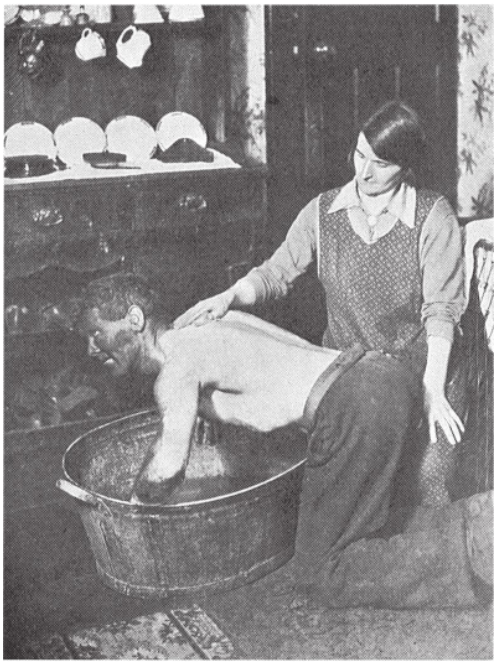 A South Wales miner takes a bath